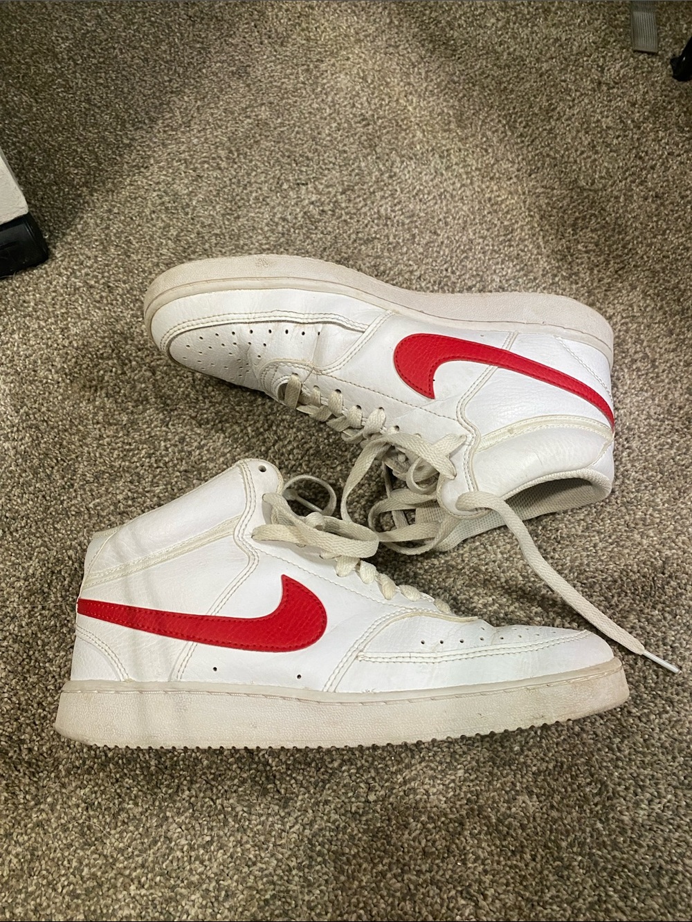 Nike White High-Top Sneakers with Red Swoosh